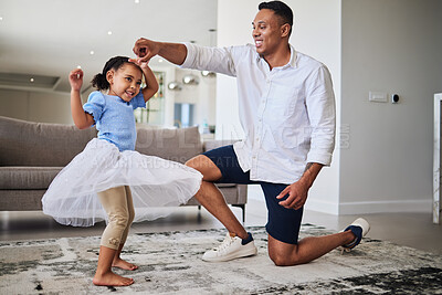 Buy stock photo Black father, girl and being happy, dance and have fun together in living room. Dad, young female child and daughter doing quality time, dancing and in tutu dress for play, celebration and happiness.