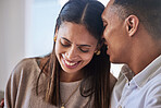 Love, happy and couple whisper in ear for relationship, secret or romantic cuddle. Smile, relax and funny with man and woman listening for care, marriage and dating at home together