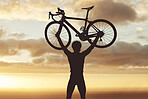 Cycling, silhouette and man lifting a bike at sunset, victory, cheering and sport goal success. Fitness, bicycle and athlete celebration in nature after physical exercise, training and achievement