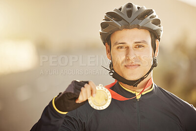 Buy stock photo Cycling, helmet and medal with a sports man after a race as a winner, champion or medalist outside. Motivation, celebration and win with a young male athlete proud of reaching a target or goal