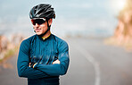 Cycling, cyclist or sports man, arms crossed and ready to cycle, ride or exercise on road. Health, wellness and happy male athlete from Canada preparing for workout, fitness or training outdoors.