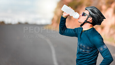 Buy stock photo Road, fitness and cycling man drinking water by a mountain tired from workout, cardio exercise and training. Bicycle, sports and thirsty biker refreshing with a healthy beverage or liquid in Texas