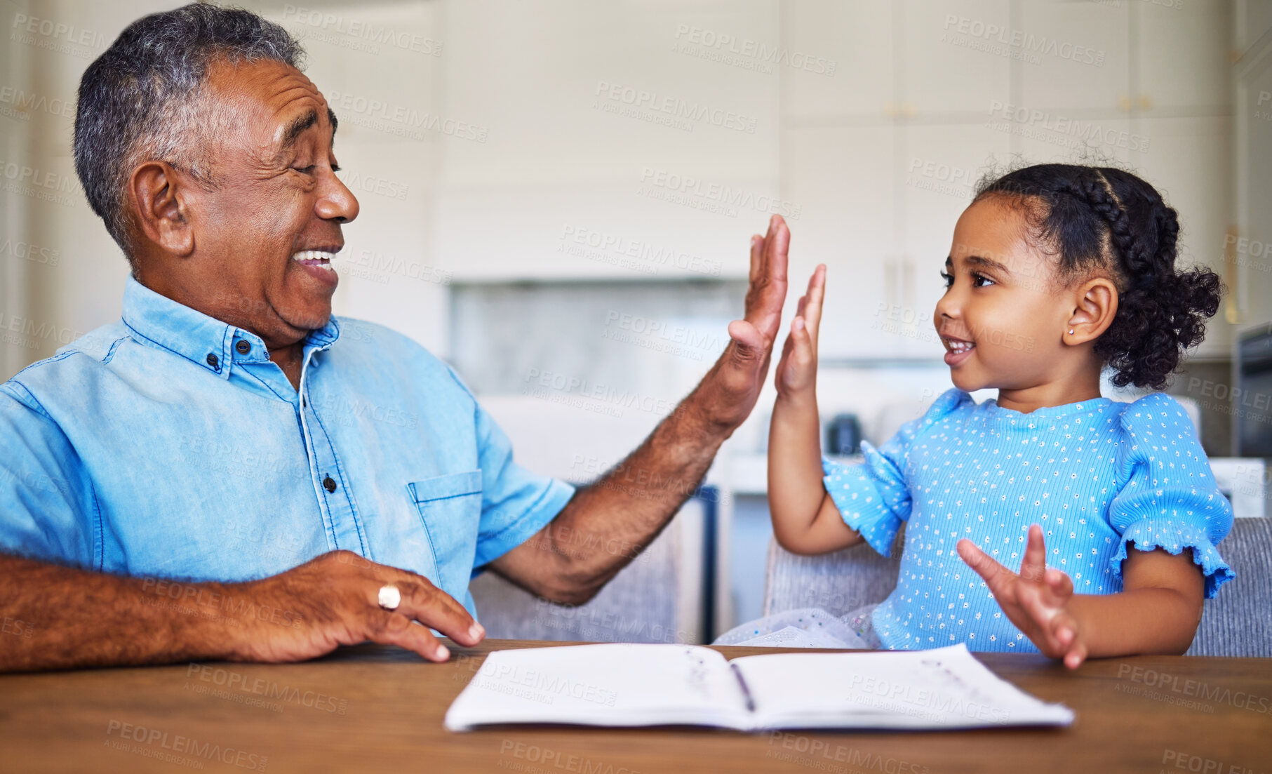 Buy stock photo High five, child learning and black family grandfather support, helping or care for home education or language development motivation. Elderly man teaching girl kid and goal target success hand sign