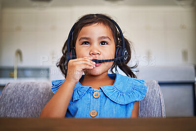 Buy stock photo Children, education and headset with a student girl distance learning from home for growth or development. Kids, video call and communication with a young female child in her house to study or learn