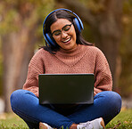 Laptop, music and girl studying in a park, talking on a video call or learning on internet in Sweden. Happy, smile and relax student reading on pc for education and knowledge with podcast in nature
