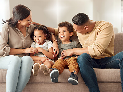 Buy stock photo Playful, children and parents on the sofa for love, care and happiness in the living room of home together. Portrait of happy, smile and young kids playing with their mother and father on the couch