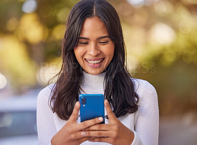 Buy stock photo Social media, phone and woman in the city for business, working and reading communication on a mobile. Happy, smile and young girl typing on a mobile app with 5g technology on the web in the street