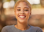 Happy, park and face portrait of black woman in nature, forest or garden for mindset peace, calm and outdoor freedom. Beauty smile, happiness and gen z student girl on holiday vacation for wellness