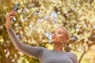 Buy stock photo Selfie pout, phone and woman in nature park relax, happy and smile while in outdoor forest for peace, quiet and freedom. Happiness, trees and silly girl picture to post to online social media app