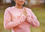 Hands, yoga and meditation with a woman in a park for mental health, wellness and calm closeup. Zen, serene and peace with a female meditating outdoor for holistic or spiritual health and faith