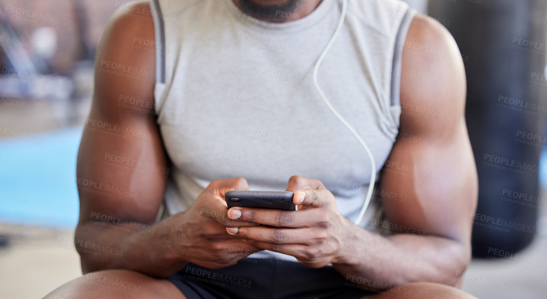 Buy stock photo Fitness, hands and phone in gym with man after workout, training or wellness exercise with social media. Strong, muscular and black man text contact, internet or web app in a health and wellness club