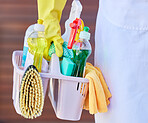 Cleaning, tools and cleaner carrying basket with liquid soap, brush and detergent spray bottle. Closeup of products for washing, hygiene and clean supplies for housekeeper, maid or domestic worker