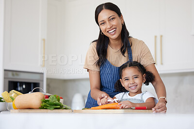 Buy stock photo Happy family, girl or child learning from mother cooking or kitchen skills with healthy organic food vegetables. Smile, development and mom teaching or helping young kid with lunch or dinner at home