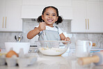 Happy girl kids baking in kitchen, house and home for childhood fun, learning and development. Smile young toddler child, little cooking chef and mixing bowl, sweets dessert, cookies and cake flour