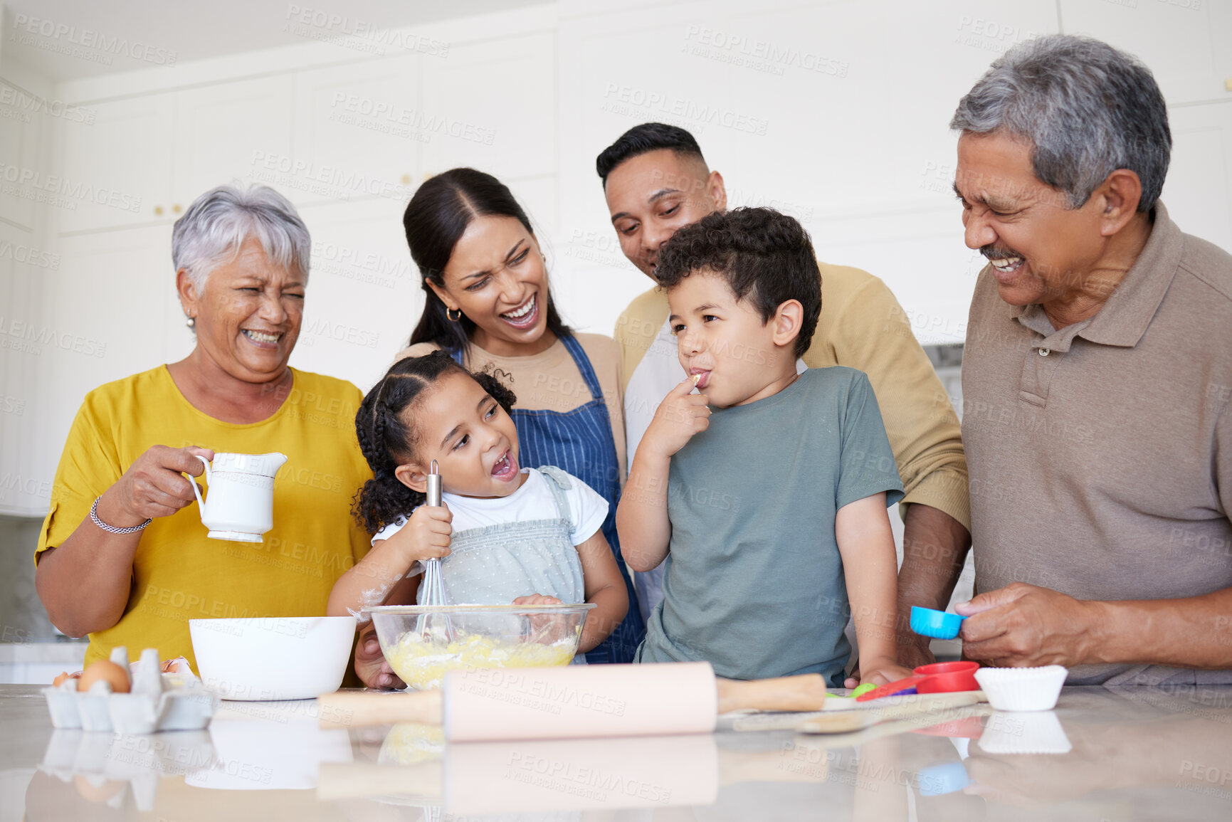 Buy stock photo Children, baking and family with a boy tasting flour while learning to bake in the kitchen with parents, grandparents and sister. Kids, learning and love with a girl and boy cooking with relatives
