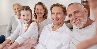 Buy stock photo Selfie, happy and big family on the sofa in their living room for happiness, care and relax together in their house. Portrait of grandparents, parents and child with smile for a photo on the couch