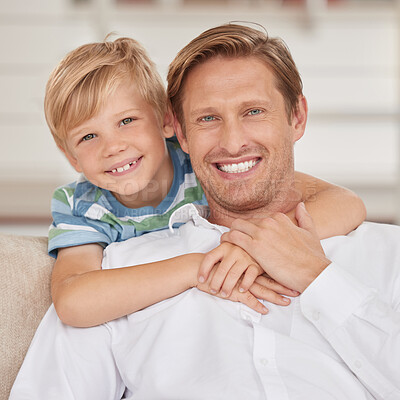 Buy stock photo Family, love and portrait of father with son sitting on the sofa, smile of faces. Happiness, affection and child bonding with single dad in family home hugging, embrace and relax together on couch