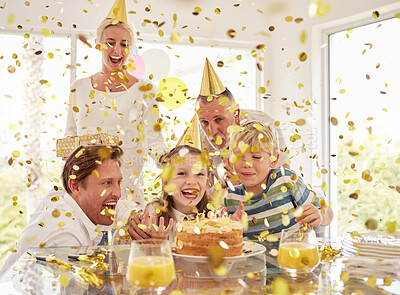 Buy stock photo Kids happy birthday party, confetti surprise and family home with cake, celebration and happiness in Australia house together. Excited children, smile parents and grandparent celebrate special event 