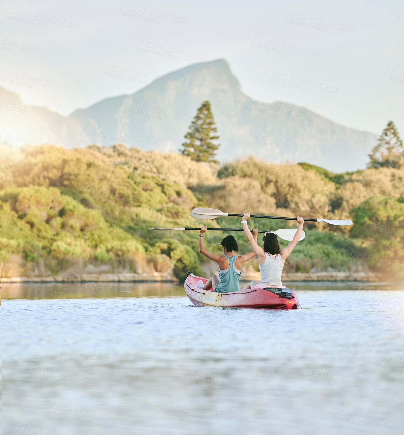 Buy stock photo Woman friends, celebrate in kayak and lake exercise in a canoe together training for summer body fitness. Female rowing, paddle on river and women workout water sport race activity on nature vacation