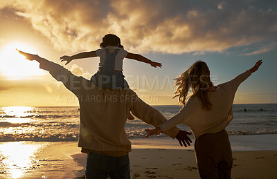Buy stock photo Family, summer and beach fun of a mother, dad and baby enjoying the ocean at sunset. Mama, father and kid with happiness in nature by the sea water happy about vacation and quality time outdoor