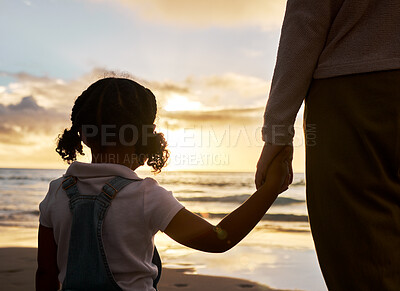 Buy stock photo Hand holding, girl and parent at a sunset, beach waves and ocean with family love and calm mindset. Nature, sea and water view with a child feeling care and relax outdoor with a peaceful experience