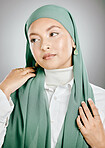 Woman, muslim and hijab in studio closeup for skincare, fashion and makeup against grey background. Islam, religion and faith with style, cosmetics and beauty for freedom, equality and human rights