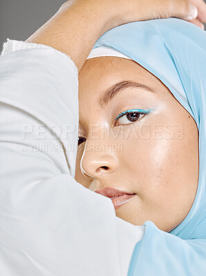Buy stock photo Muslim, woman face and beauty, makeup and hijab with Islamic fashion, natural cosmetics advertising with studio background. Beautiful, young and traditional head scarf, glow in closeup portrait.