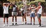 Fitness, basketball court and stretching, sport and men warm up for practice and training, basketball sports game. Young, black men and strong, muscle and prepare body, team player outdoor.