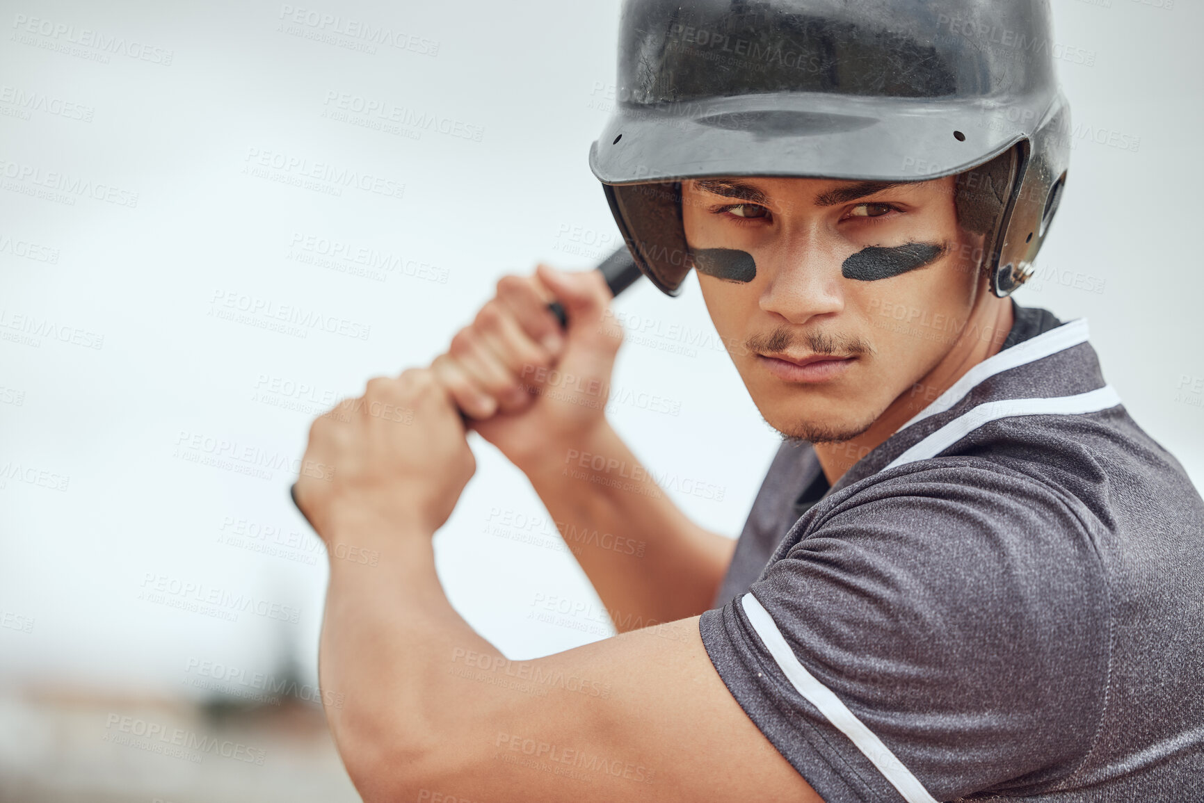 Buy stock photo Focus, baseball and athlete with a bat on a field ready for the game or training with motivation. Mindset, fitness and man playing a softball match, sports exercise or workout on an outdoor pitch.