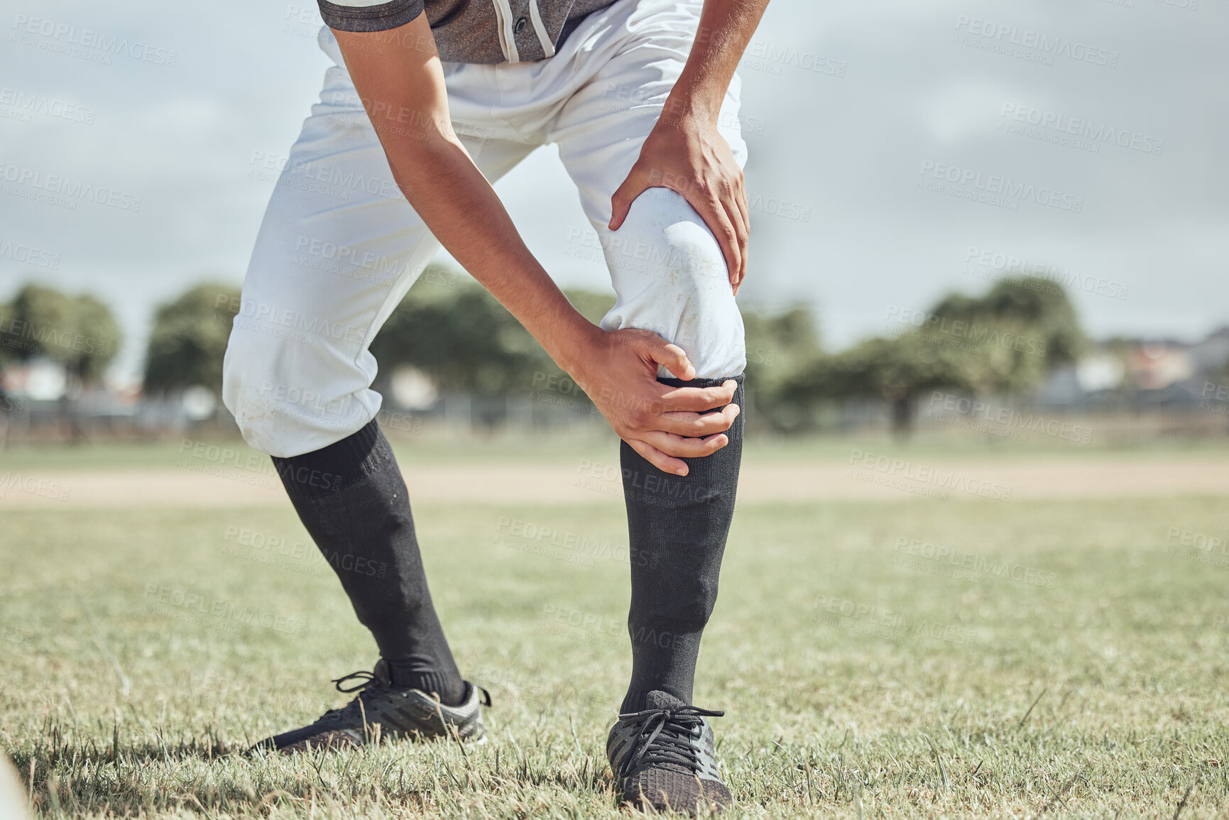 Buy stock photo Baseball leg injury, man and sports athlete on a outdoor grass field hurt in the summer. Baseball player experience a muscle pain from workout exercise, fitness and cardio game training accident