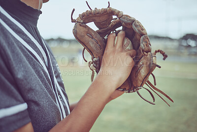Buy stock photo Baseball player, hands or ball in mitt on grass field for fitness, workout and training in game, match and competition. Zoom, baseball glove and sports athlete in energy exercise for softball pitcher