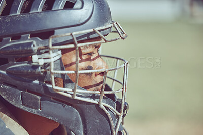 Buy stock photo Baseball, sport and helmet with a sports man on a grass pitch or field during a game for exercise or fitness. Workout, training and competition with a male athlete playing sport at an outdoor event