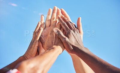 Buy stock photo High five, sports and team with support, motivation and solidarity during a game with a blue sky. Group of people, athlete friends or men with hands together for a win, success and partnership
