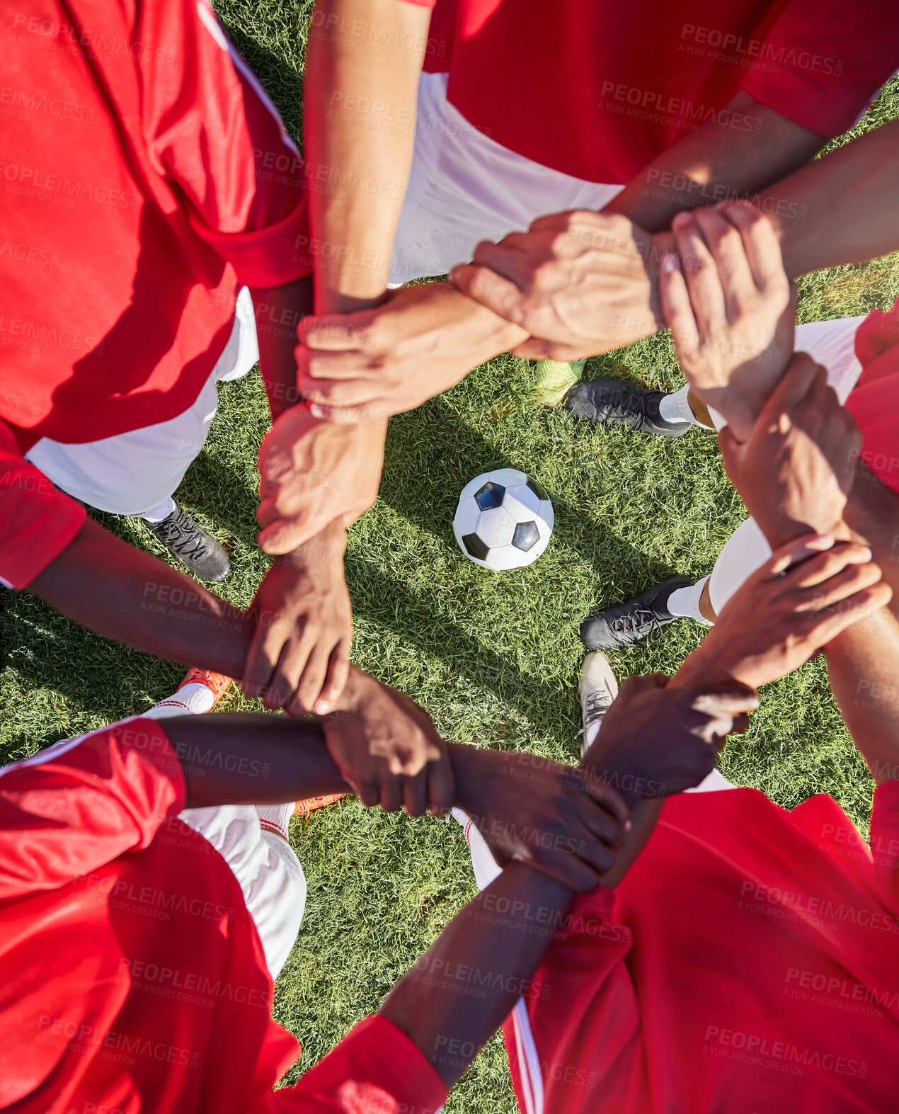 Buy stock photo Support, football and hands of team for sports on grass field for training, teamwork or collaboration. Fitness, workout or exercise with people in circle and soccer ball for goals, growth and friends