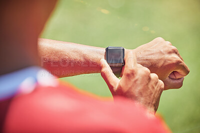 Buy stock photo Smartwatch, screen mock up and fitness hands man check time running results, sports or training workout progress on green pitch field. Athlete on smart watch for exercise goal tech with green mockup