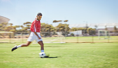 Buy stock photo Football, running and soccer man with a ball doing a sport exercise, workout and training. Speed, action and young male athlete in a sports team uniform run a fitness cardio on a grass field
