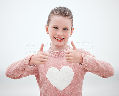 Buy stock photo Happy, teenager girl and hands in thumbs up with smile for gesture, sign or symbol against a grey background. Portrait of female teen smiling with hand for okay, yes or great emoji in happiness