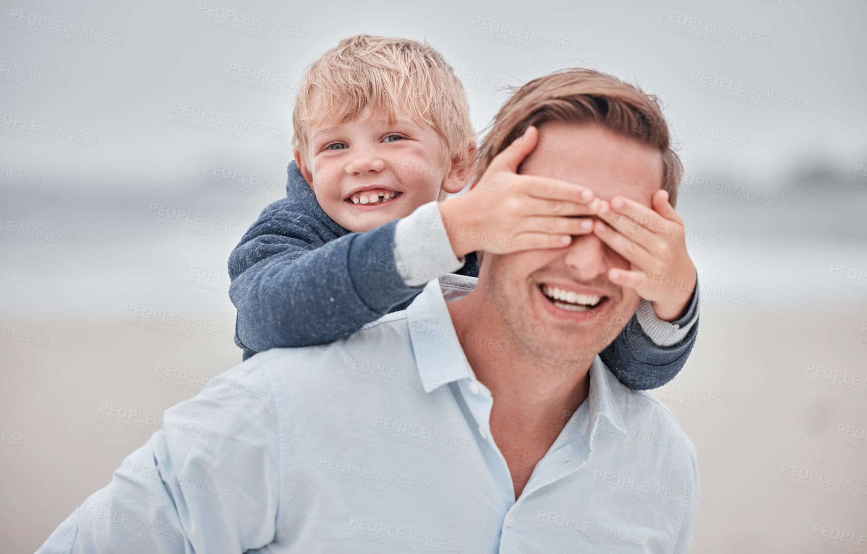 Buy stock photo Father, child and hands on eyes in piggyback for playful fun, happiness or bonding together in the outdoors. Portrait smile of happy dad and kid playing in joy for back ride, free time and moments