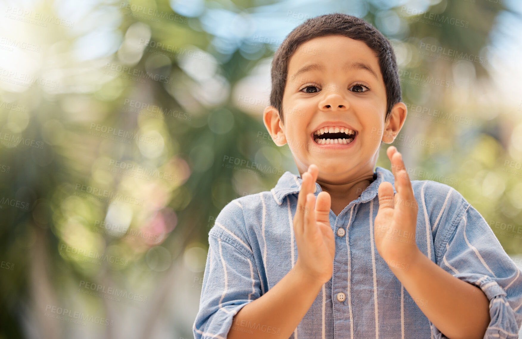 Buy stock photo Happy, wow and boy clapping hands in in a park, excited and surprised by good news, nature and learning. Portrait, child and hands by kid face in shock, happiness and celebrating fun in a forest 