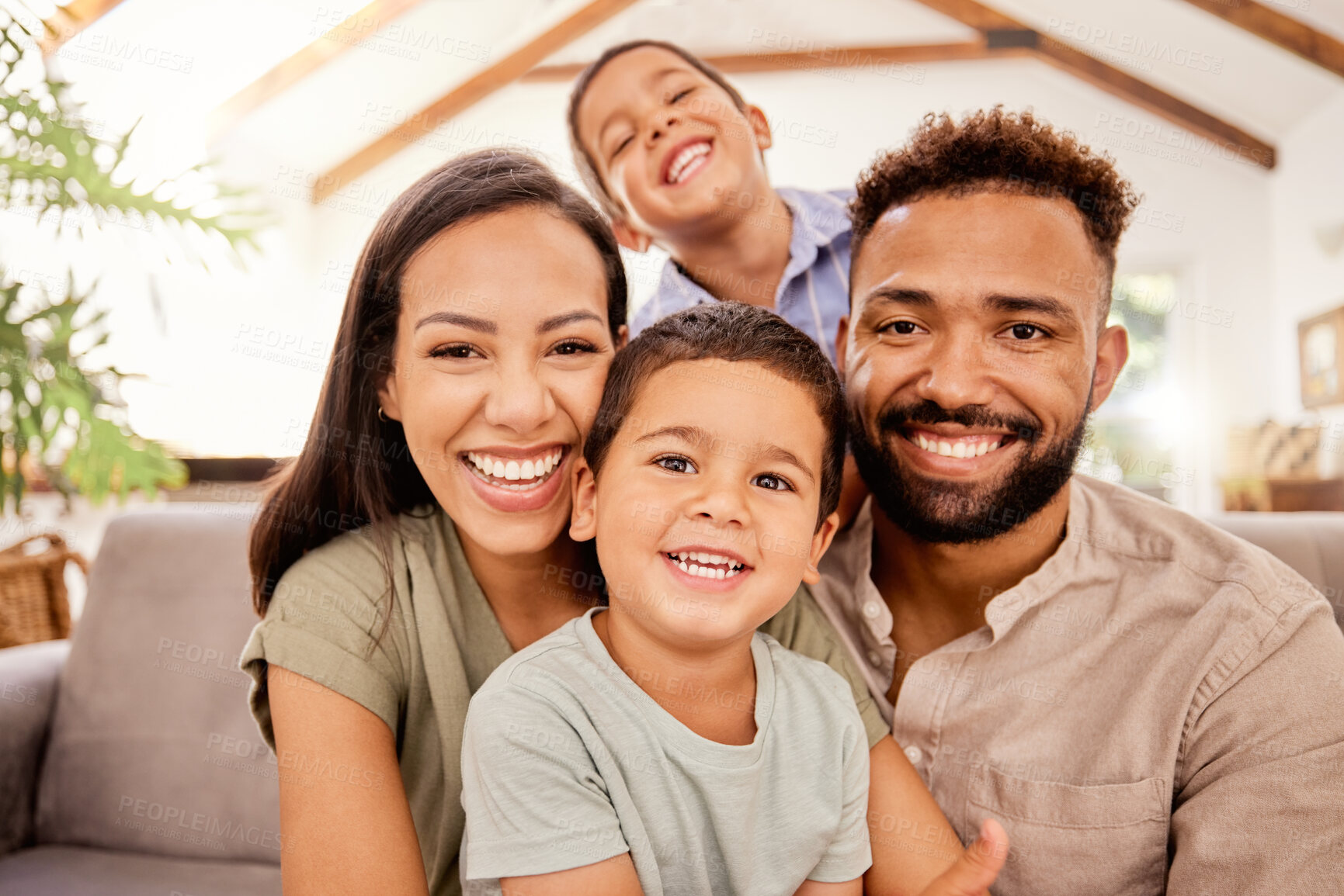 Buy stock photo Black family, kids and sofa for portrait with smile, love and happiness in home, vacation or holiday in summer. Mom, dad and children with happy, face and bonding on couch in house in Los Angeles