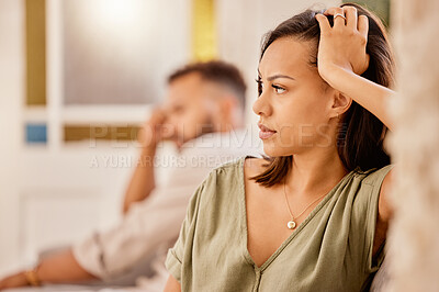 Buy stock photo Angry, argue and divorce with a black woman ignoring her husband while sitting on a sofa in the living room. Stress, couple and fight with a wife feeling anger during a conflict with her cheating man