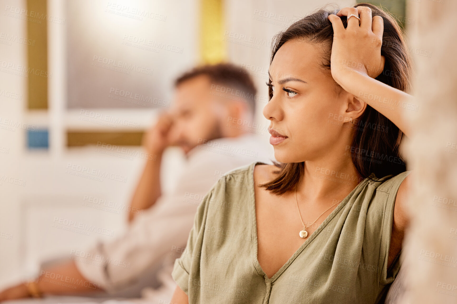 Buy stock photo Angry, argue and divorce with a black woman ignoring her husband while sitting on a sofa in the living room. Stress, couple and fight with a wife feeling anger during a conflict with her cheating man