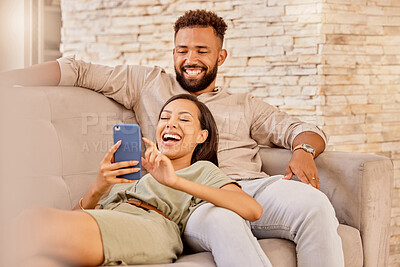 Buy stock photo Couple, laughing and phone funny meme content of happy people laughing on a lounge home couch. Mobile video streaming and social media app scroll of people with wifi technology on a house sofa 