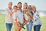 Love, family or portrait in park with grandparents and children for summer, outdoor holiday or wellness. Happy big family, senior man and woman with mom, dad and kids in nature in summer on vacation 