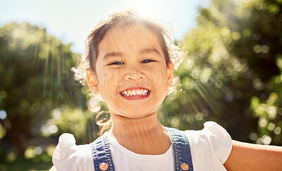 Buy stock photo Summer, sunshine and portrait of Asian child in the park smile on face, playing and enjoying nature. Happiness, joy and young girl having fun outdoors on weekend, holiday and adventure on sunny day