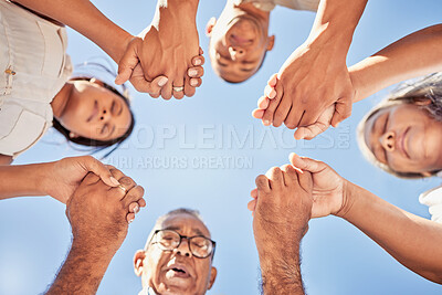 Buy stock photo Worship, prayer and family holding hands praying together for higher power, grace or spiritual help bottom view. Blue sky, christian religion people and bible community hope for Jesus or god support