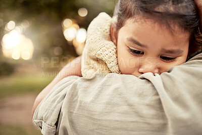 Buy stock photo Hug, park and sad girl with parent for comfort, care and support while outdoors in nature. Family, love and mom embracing, hugging and holding child in arms comforting worried, upset and unhappy kid