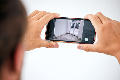 Buy stock photo Surveillance, cctv and smartphone screen in hands for door monitor on wall mock up for trust, safety and home insurance security. Man on cellphone technology app online, live streaming camera system