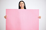 Woman, empty banner and blank poster in pink for mock up advertising and marketing sign for logo promotion deal and product placement. Girl happy with paper, billboard and branding space on board