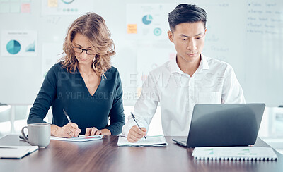 Buy stock photo Notes, marketing and employees, planning, meeting and working with a laptop in partnership in an office at work. Corporate workers writing strategy for a business idea on the internet with a computer